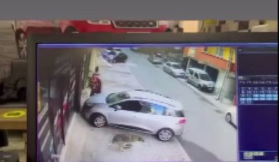 Sancaktepe’de köpekten kaçan adam otomobilin üzerine çıktı