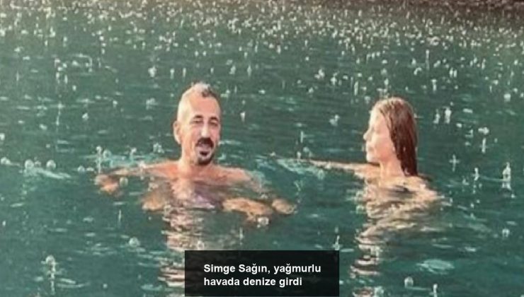 Simge Sağın, yağmurlu havada denize girdi